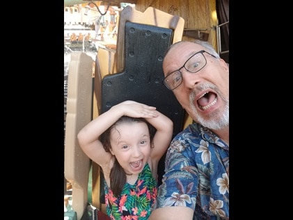 Hilton Grand Vacations Owner at Disney World with granddaughter